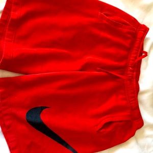 Red NIKE shorts:size medium